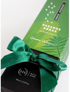 Wrapping the product with a green ribbon + scent spraying